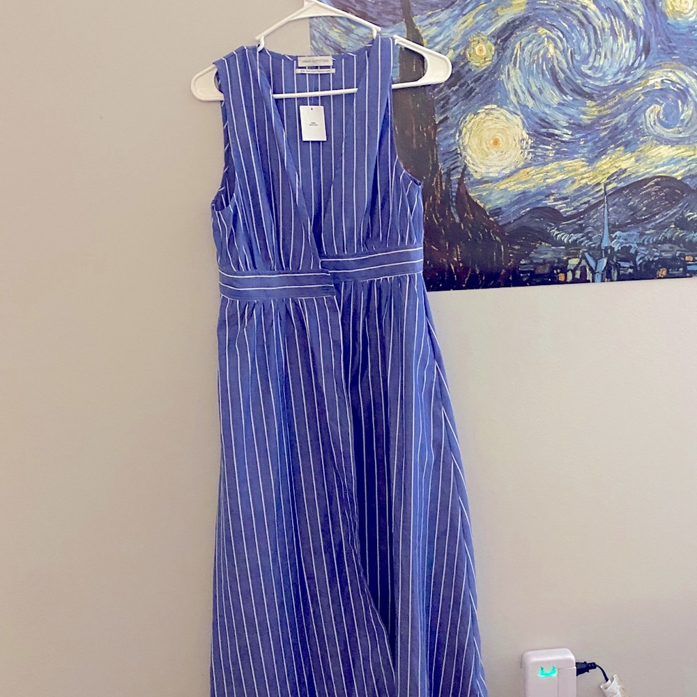 A mixed bundle of dresses, pants, sweaters, etc.